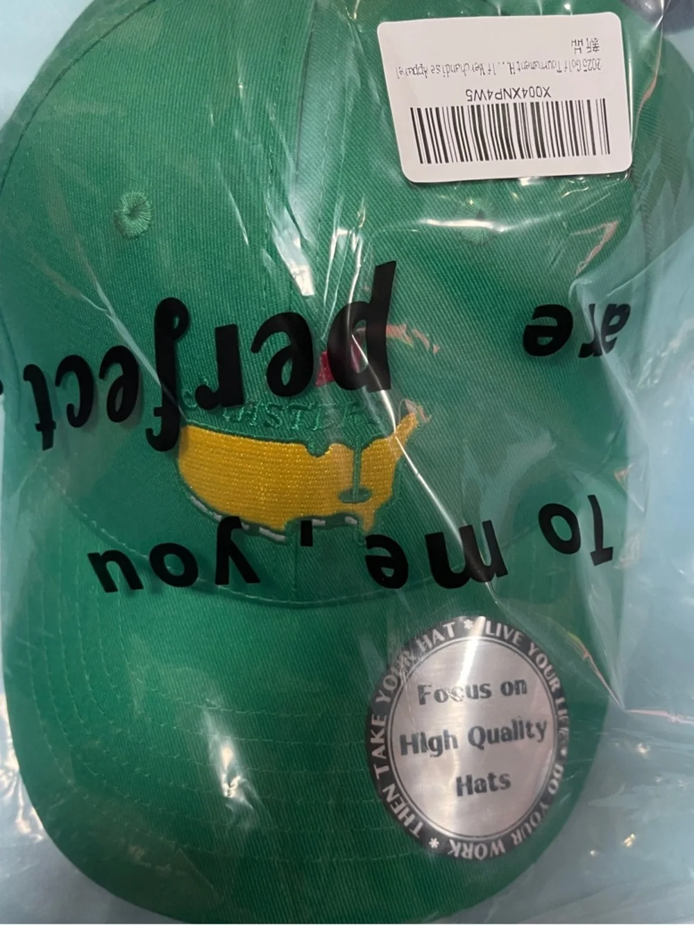 Masters Green Hat with Yellow & Red Logo